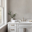 Raffia-like wallpaper in light gray, mimicking a hand-stitched weave ideal for adding organic warmth to modern interiors.