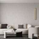 Light gray vertical shimmer plaster wallpaper alternating smooth recesses and velvety ridges with a delicate light catch. A refined neutral wall finish with quiet movement. Wallpaper requires adhesive.