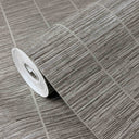 Gray grasscloth texture wallpaper featuring a handwoven appearance with horizontal and vertical fibers in warm gray tones. Ideal for living rooms and study alcoves, this wallpaper adds natural woven texture and architectural presence.