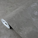 Gray shiny limewash texture wallpaper with a rough-textured plaster surface and crystalline luster, ideal for dramatic feature walls in modern living rooms.