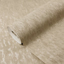 Taupe vertical shimmer plaster wallpaper with a soft, dappled surface, offering understated glamour and warmth to feature walls.