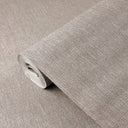 Taupe vertical lines wallpaper with a narrowly ribbed texture, emphasizing height and structure in contemporary living spaces.