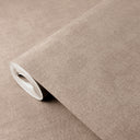 Taupe linen plaster texture wallpaper with a tight, pebble-like weave and warm beige nuances. Ideal for cozy living areas or feature walls, providing a soft, earthy backdrop. This high-quality, eco-friendly wallpaper is washable and requires adhesive for application.