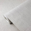 Light gray vertical lines wallpaper with subtle brush stroke texture, ideal for modern living areas or calm workspaces, offering a matte finish and eco-friendly material.