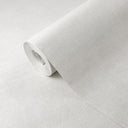 White linen plaster texture wallpaper with a fine woven textile appearance. This removable wall mural offers a clean, neutral palette with a matte finish, creating a refined, subtle backdrop ideal for bedrooms or office walls. Made in the USA with eco-friendly materials.