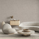 Elegant beige limewash wallpaper with a soft pearlescent finish features varied texture with mottled base and brush marks. The gentle shimmer adds depth without strong patterning, making it perfect for modern-luxe rooms. Adhesive application required, ideal for designers looking for understated elegance.