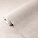 Light taupe linen plaster wallpaper with a faint woven structure and subtle tonal shifts, ideal for cozy interiors.