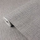Tweed texture wallpaper in dark gray with speckled textile effect, perfect for adding a refined, lived-in feel to home offices or hospitality spaces.