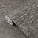 Gray charcoal limewash wallpaper with painterly strokes and metallic cast, ideal for creating an urban, timeworn aesthetic in lofts or galleries.