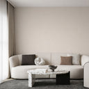Limewash texture wallpaper in soft beige with painterly, overlapping strokes forming a low-contrast grid. The artisanal design and subtle tonal shifts make it suitable for dining areas or corridors, offering a unique, handcrafted plaster appearance.