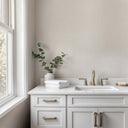 Beige wallpaper with vertical shimmer effect, featuring brushed strokes that add understated luminosity to bedrooms and reception areas.