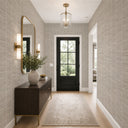 Warm beige wallpaper with a pronounced texture and tactile mid-scale design, suited for coastal or casual home decor.