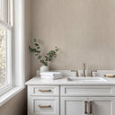 Beige vertical shimmer plaster texture wallpaper with short brushed strokes and a soft sueded nap that catches light in faint highlights. The warm plaster finish brings subdued luxury to bedrooms, hospitality suites and feature walls. Adhesive application required.