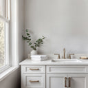 Linen plaster texture wallpaper in light beige with a crosshatch pattern, offering gentle relief and a tactile surface. The neutral tones and subdued design make it perfect for creating a tranquil ambiance in bedrooms or calm commercial interiors.