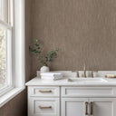 Contemporary brown shimmer wallpaper with gentle tonal shifts, perfect for accent walls where a velvety, light-reflecting surface enhances modern home decor.
