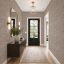 Sand beige grasscloth wallpaper with a tactile, fibrous texture and subtle checked effect. The cooler gray and faint rose undertones provide a warm backdrop for bedrooms and dining rooms. This strippable, eco-friendly wallpaper is crafted from high-quality materials and requires wallpaper adhesive for installation.