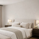 Removable limewash texture wallpaper in cream tones, featuring a non-directional pattern with faint relief. This high-quality wall mural is ideal for creating a serene interior design in bedrooms or corridors, offering a matte, plaster-like finish. Made in the USA and eco-friendly.