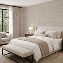 Beige grasscloth wallpaper showcasing interlaced grain and natural fiber variance, adding an earthy touch to any room.