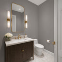 Detailed view of ash gray wallpaper with a woven linen effect, providing a neutral backdrop for contemporary home decor.