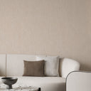 Beige vertical shimmer plaster wallpaper with a delicate sheen and sueded texture. The brushed surface adds subtle highlights and depth, ideal for luxury interiors. Adhesive application required, perfect for bedrooms or feature walls seeking refined, tactile sophistication.