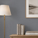 Blue gray linen texture wallpaper with a fine woven grid of pale slate and mid-gray threads. The small-scale crosshatch mimics fabric weave in a matte, textile-like finish, giving offices and bedrooms a calm, structured cool-neutral backdrop. Adhesive required.