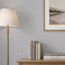 Close-up of gray linen wallpaper with a gently textured surface and uniform, slightly raised weave, perfect for gallery walls and hospitality spaces needing a calm, textile effect.