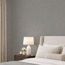 Light gray limewash wallpaper with subtle brush stroke texture, perfect for creating a serene and stylish interior design.