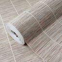 Sand beige grasscloth texture wallpaper featuring a subtle checked pattern with cool gray and faint rose undertones. Ideal for creating a natural backdrop in bedrooms or dining rooms, this wallpaper conceals small wall flaws while adding warmth and depth. Made with high-quality materials, it's perfect for decorators seeking an eco-friendly, tactile finish. Requires wallpaper adhesive.