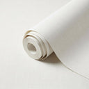 A roll of off-white textured wallpaper, partially unrolled on a matching light background.